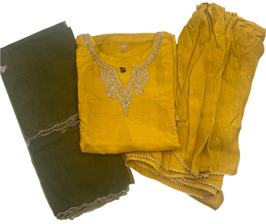 Yellow embroidered kurta set with matching dupatta and green pants, festive ethnic wear