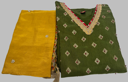 Green embroidered kurta with gold detailing and mustard yellow dupatta, festive ethnic wear