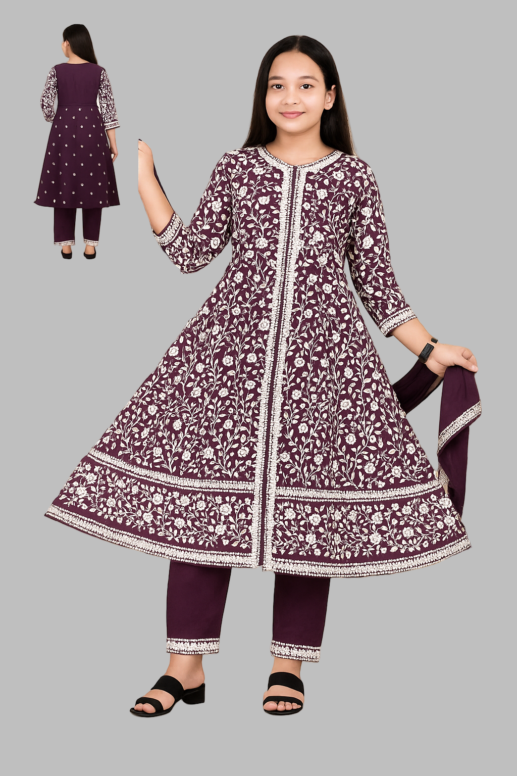 Woman wearing a purple floral dress with matching pants, standing against a neutral background with 'NMS Creations' branding.