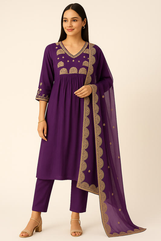 Woman wearing a purple traditional outfit with gold embroidery on a beige background