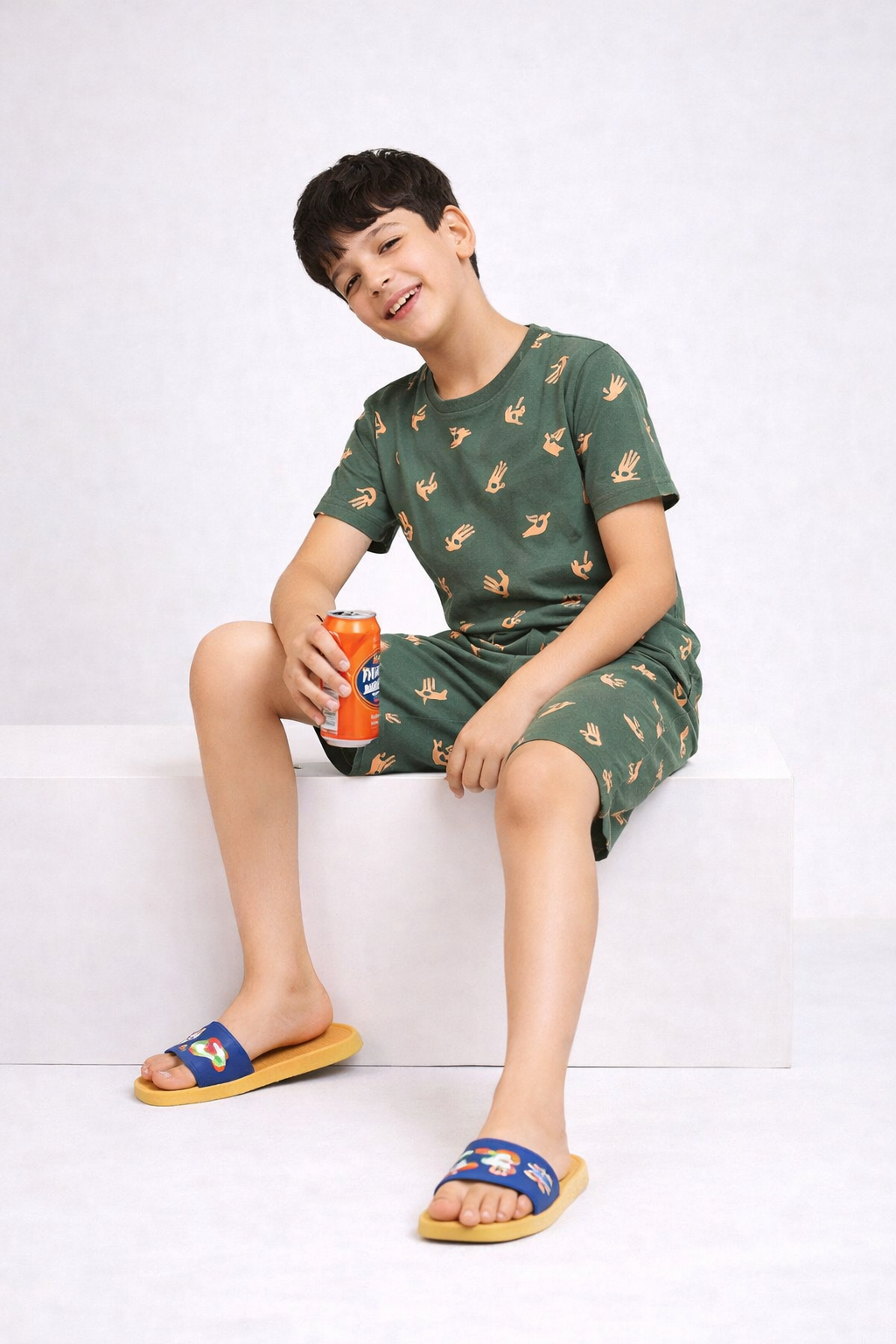 Boys olive green hand-sign print short night suit front view