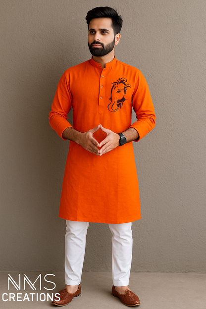 Man wearing an orange kurta with white pants against a brown background, with 'NMS Creations' branding.