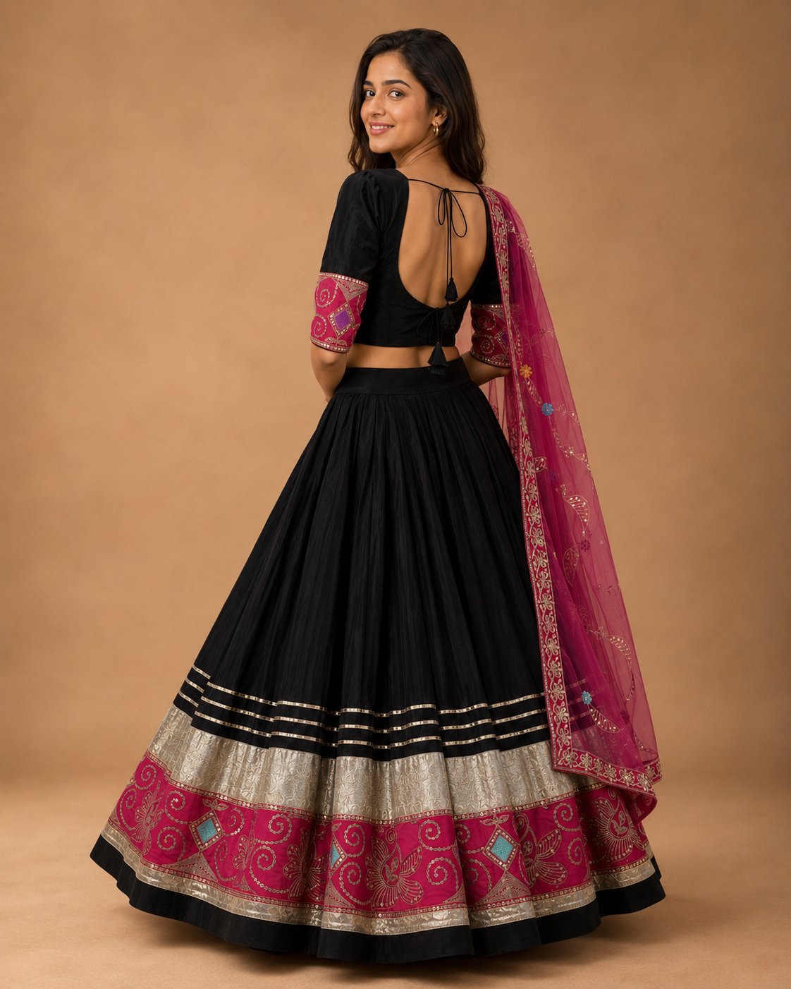 Black and fuchsia embroidered Chaniya Choli open tie-back view