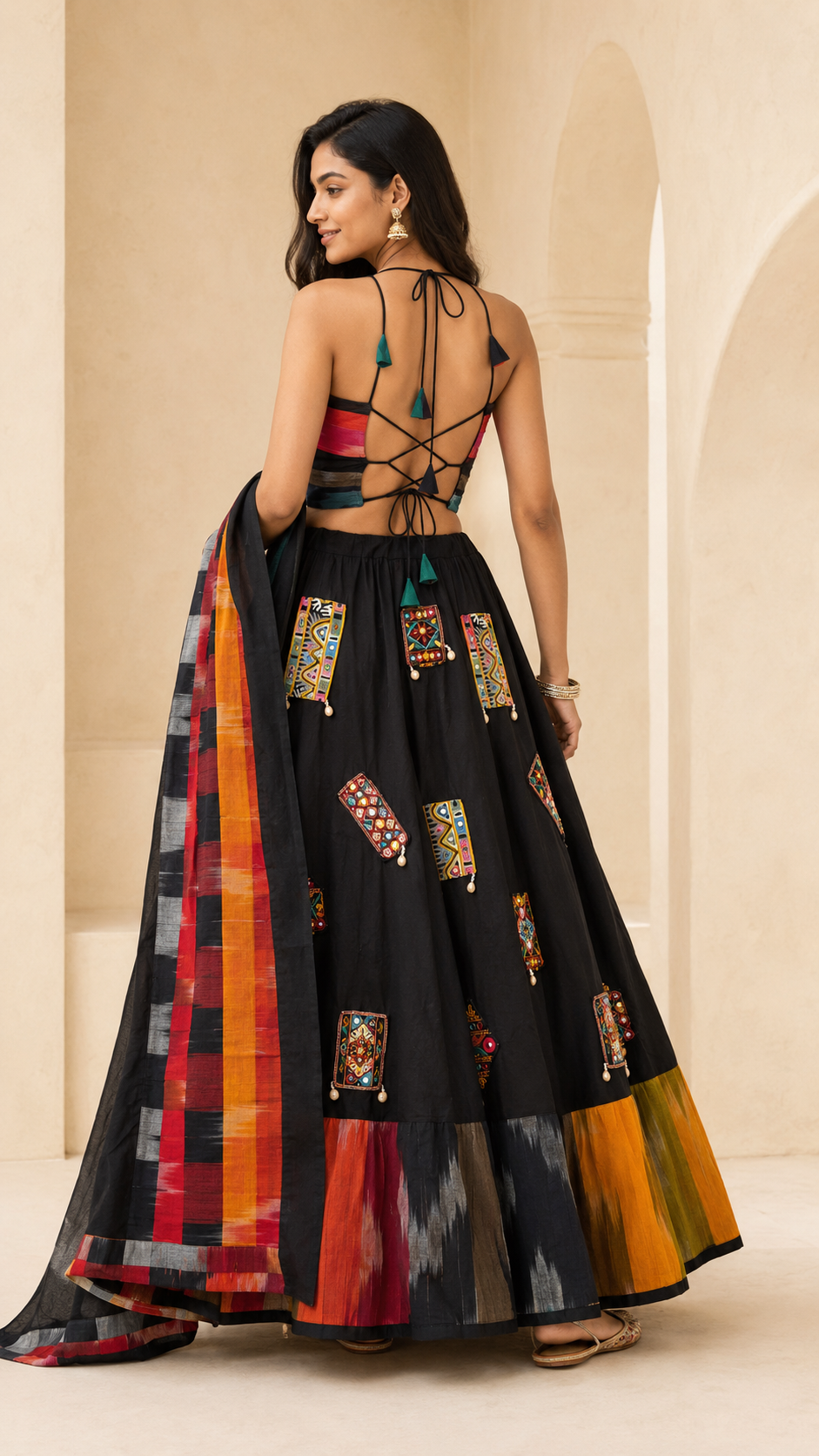 Back view showing adjustable tie-back choli and lehenga