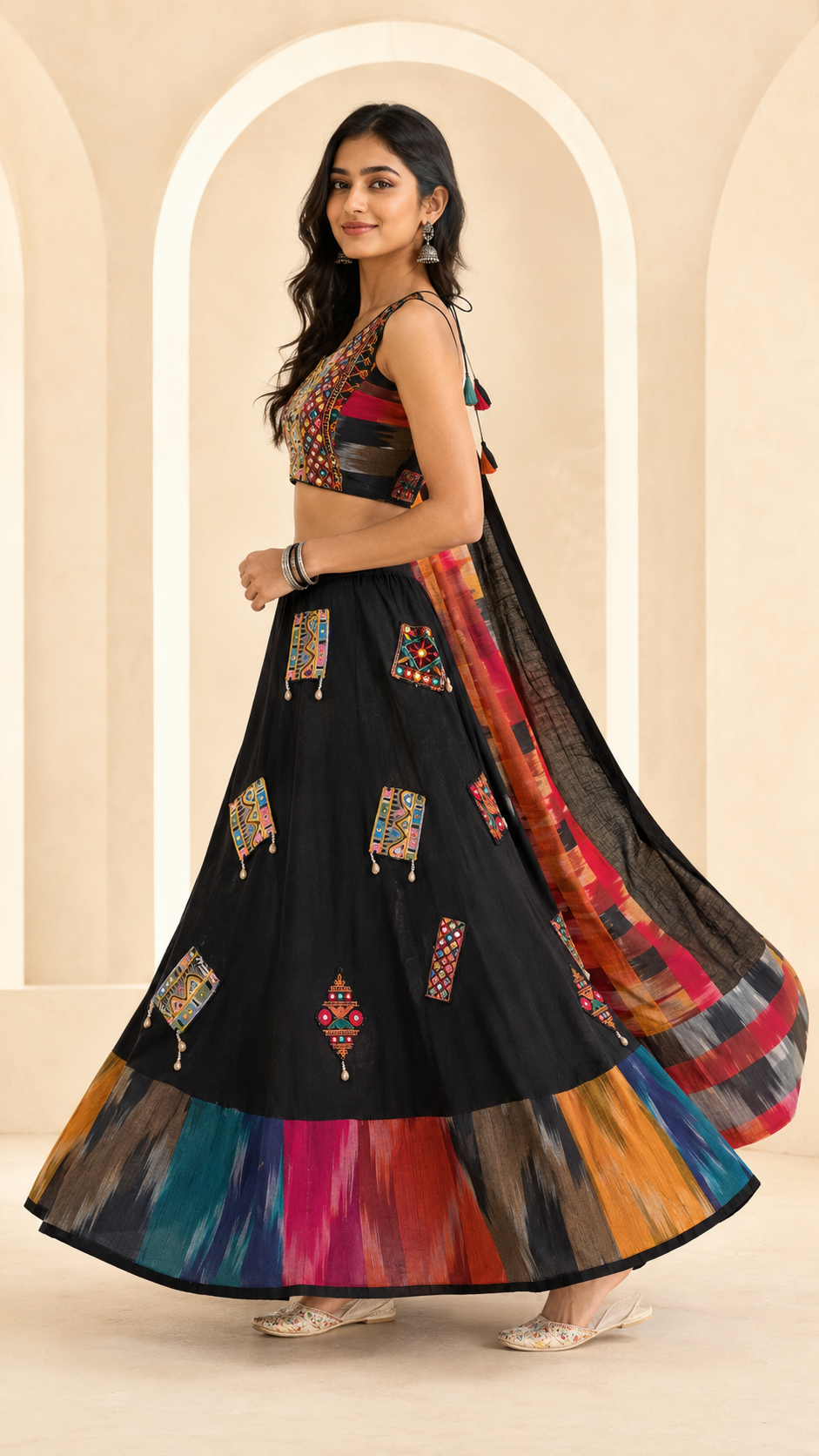 Side view showing the flare of black multicolour Chaniya Choli