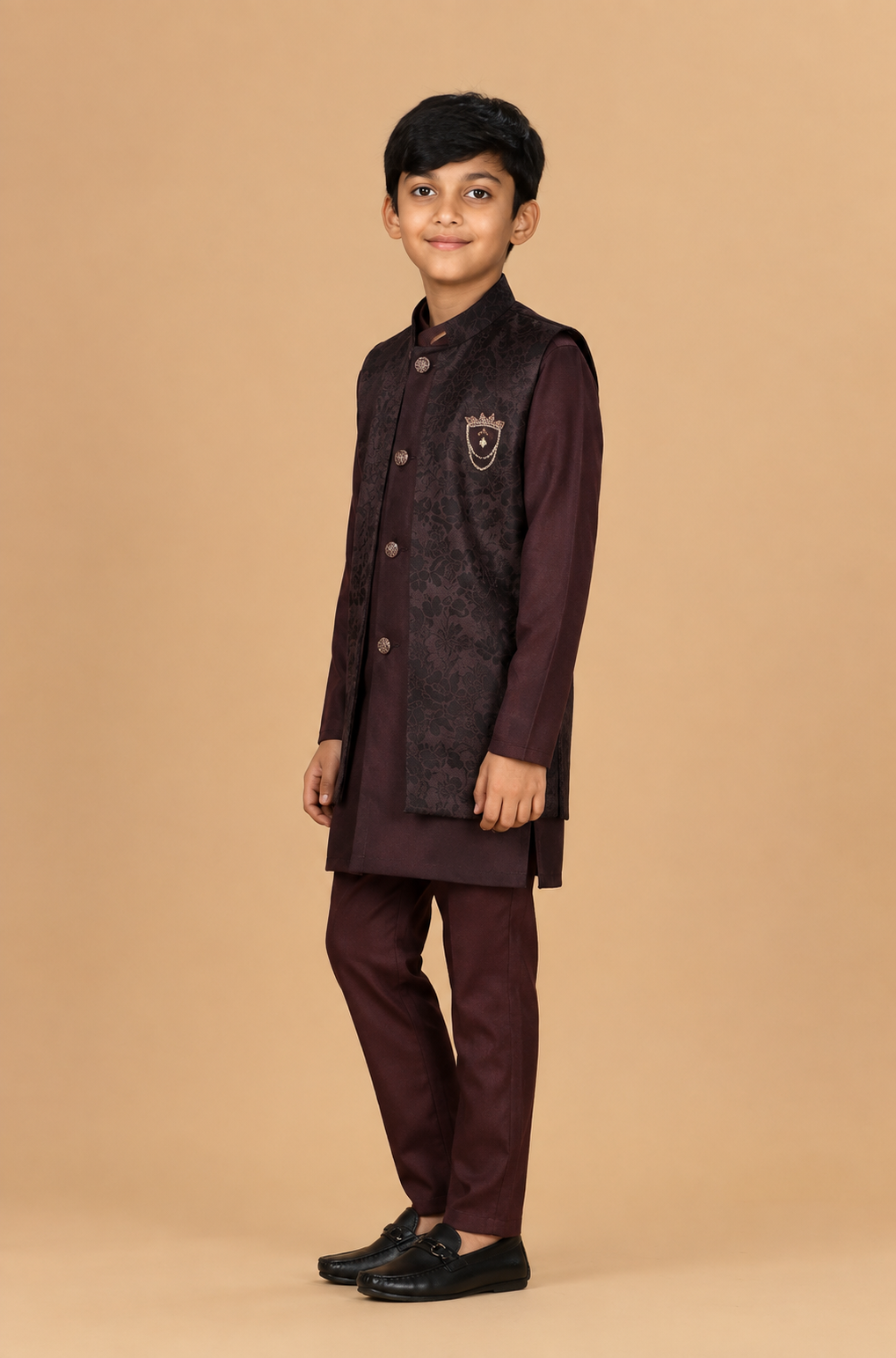 Three-quarter view of the Boys Wine Maroon three-piece kurta jacket set