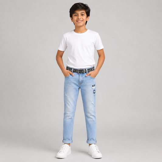 Boy model wearing sky blue printed denim jeans with a black belt