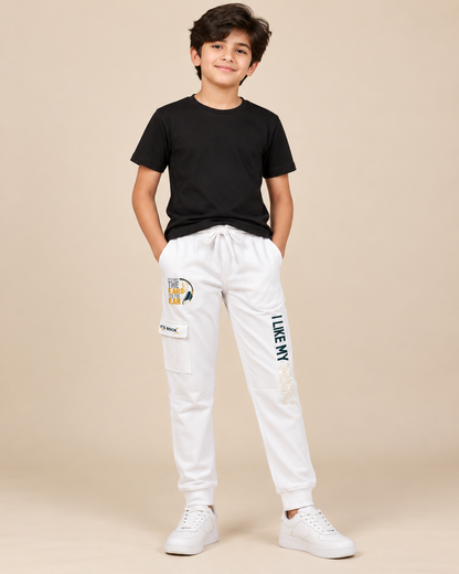 Boys white cotton cargo trousers with music graphic, front model view