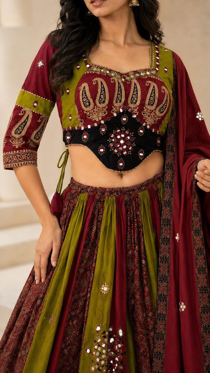 Close-up of paisley print mirror work and colour-blocked Chaniya Choli blouse