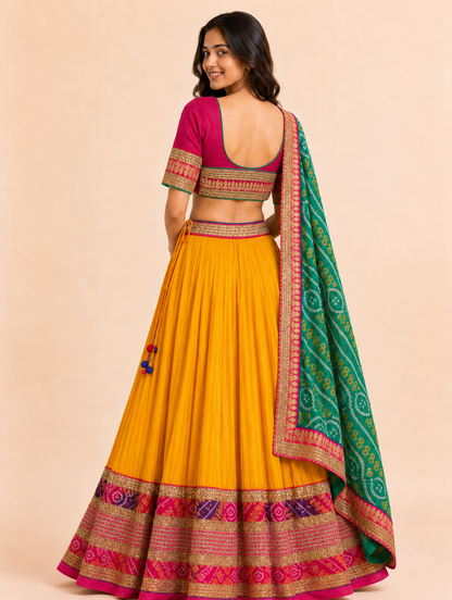 Mustard yellow Chaniya Choli back view showing deep U-back and embroidered lower-back blouse panel