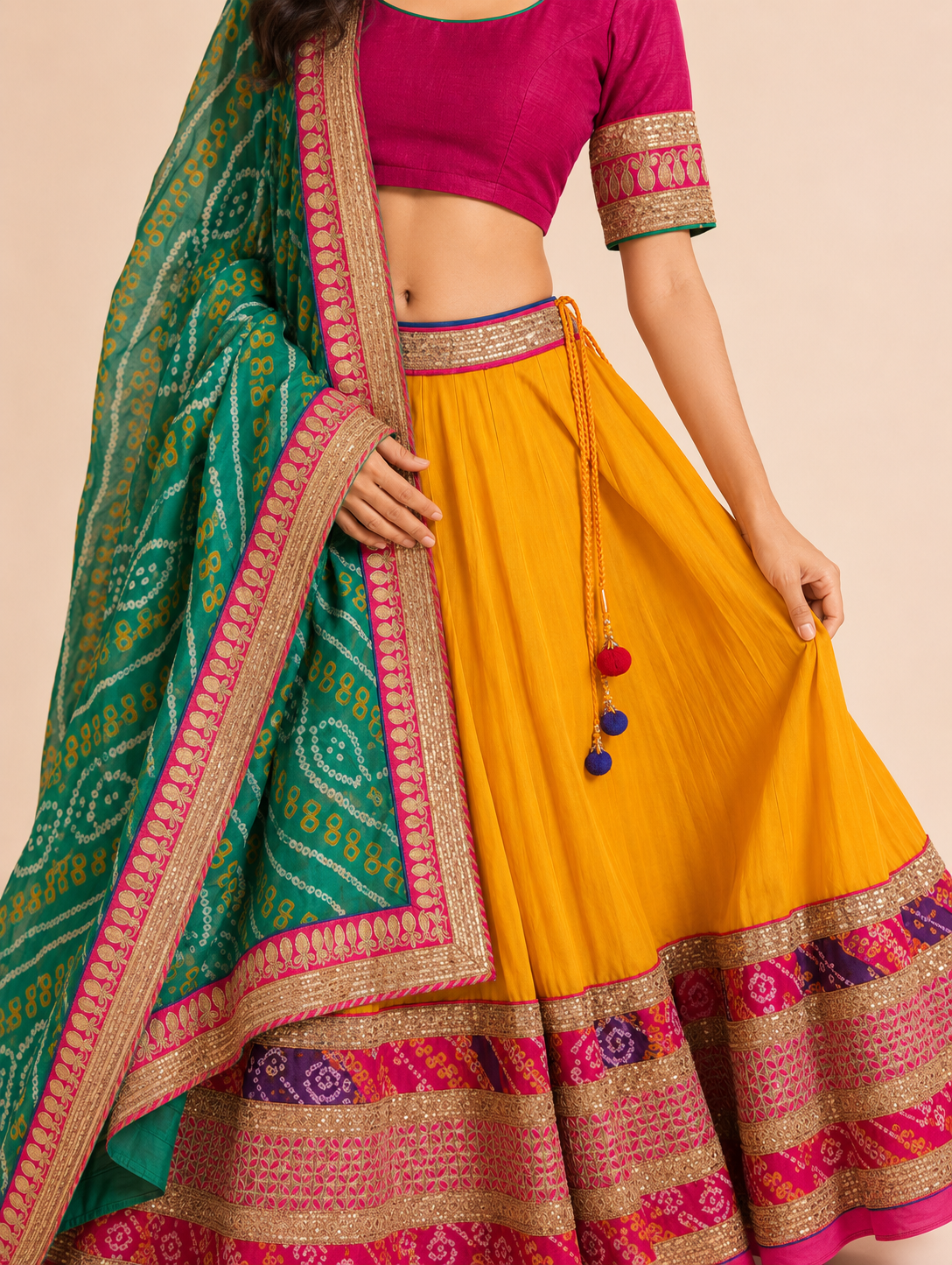 Bandhani dupatta, blouse cuff and lehenga border craftsmanship detail