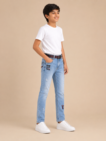 Boys sky blue printed denim jeans with belt – side view